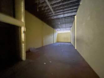 Wide empty warehouse area with concrete floor in Colon Panama Free Zone