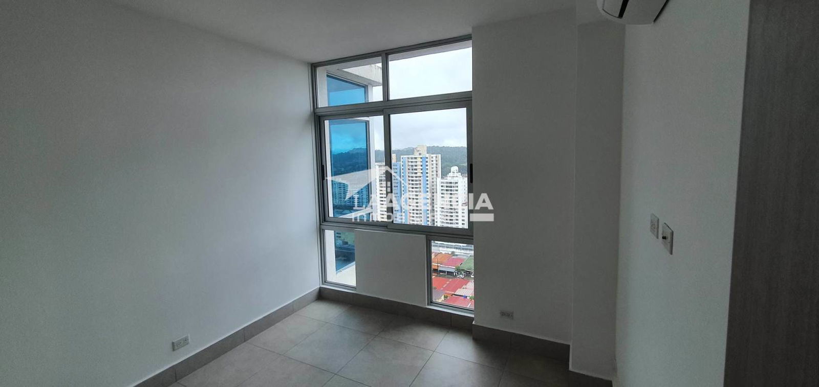 Spacious master suite large windows city skyline view PH Elite 500 Dos Mares Panama