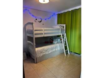 Dining area with AC, large window, open design at Ibiza Beach Residences Bijao Panama