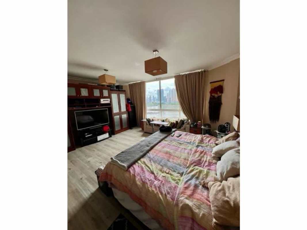 Bedroom with track lighting, workspace and pop art in PH Bayside Punta Paitilla Panama