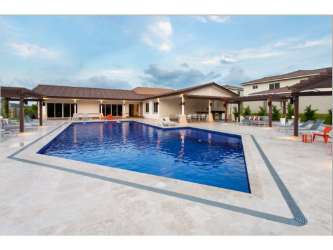 Large swimming pool and social areas in gated Bosques del Pacífico Panama Pacifico community