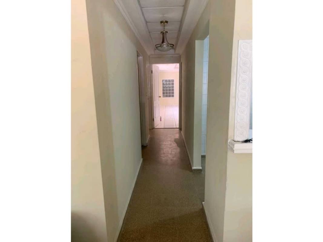 Interior hallway with lighting, beige walls, decorative trim, Villa Lucre Panama