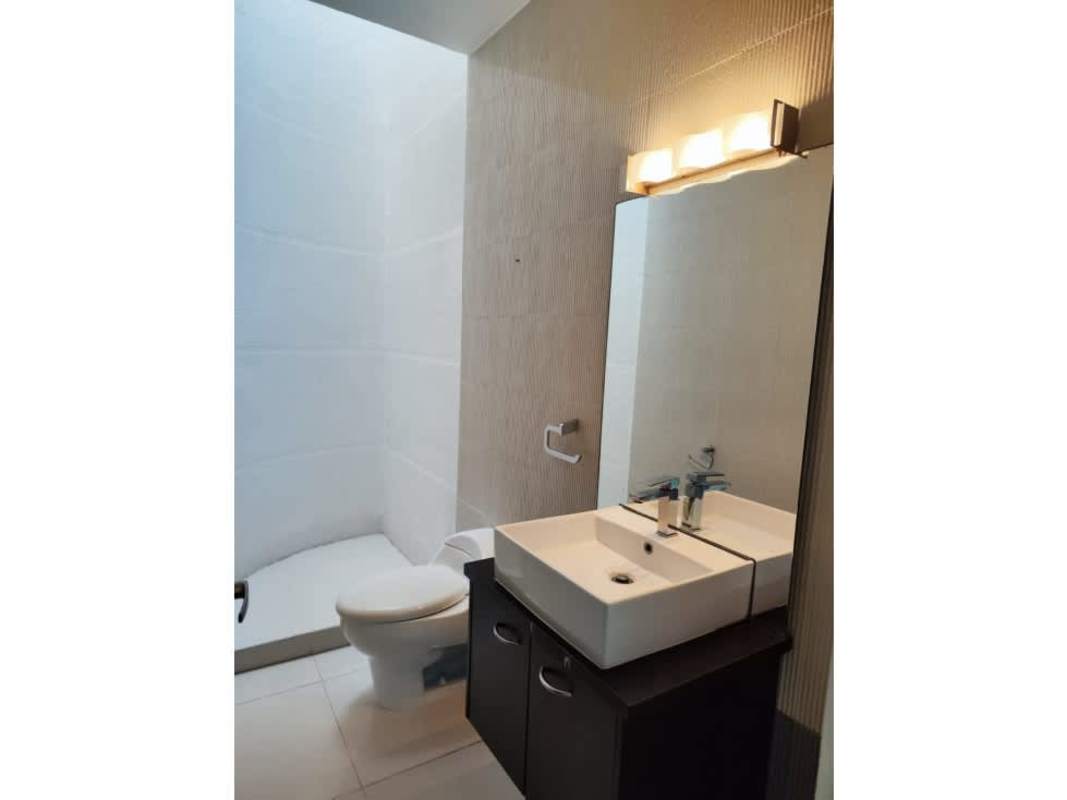 Private swimming pool surrounded by tropical greenery in Costa Sur home for sale Panama