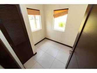Bright living room vaulted ceiling ceramic tile flooring Costa Blanca Golf & Villas Río Hato Panama