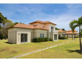 Bright hallway with ceramic tile floors wooden doors inside villa Costa Blanca Golf Resort Panama