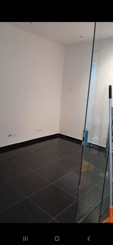 Large open workspace with granite floors and floor electrical outlets in PH SL55 Obarrio Panama