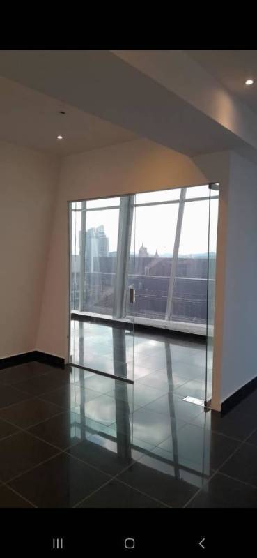 Modern office meeting area with glass walls, sleek lighting in PH SL55 Obarrio Panama