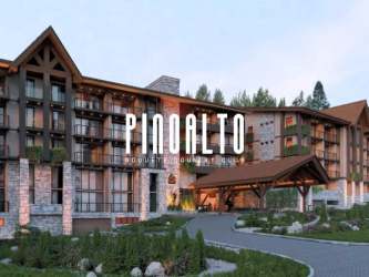Open-concept living room with kitchenette, natural lighting, Boquete Pinoalto Condo