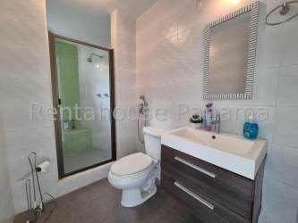 Spacious living dining area tile floors ceiling fans Coronado beach house for sale Panama