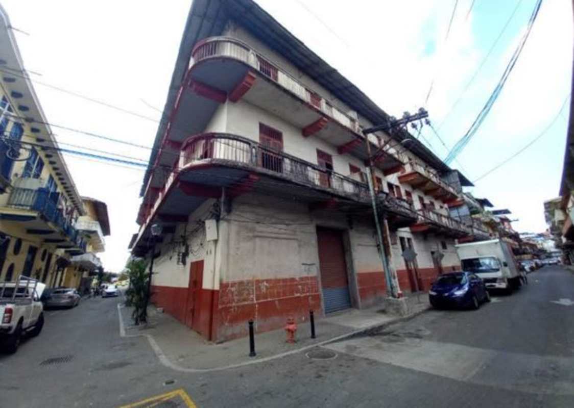 Three-story colonial-style building with multiple wrap-around balconies in Casco Antiguo Panama