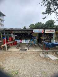 Rustic outdoor market stall with signage covered by metal roof in Bugaba David Chiriqui Panama