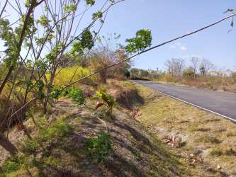 Land plot frontage paved road access in San José area near beaches