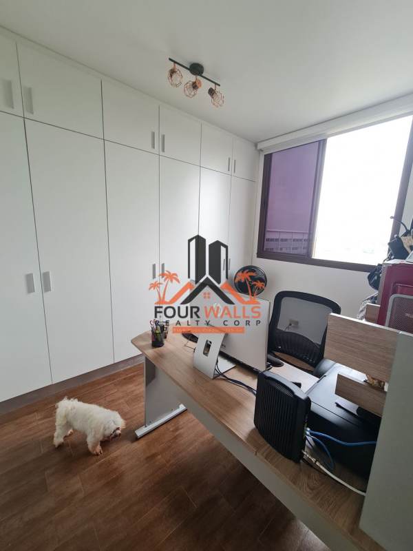 Modern home office or den built-in cabinets window PH Costamare Costa Sur Panama