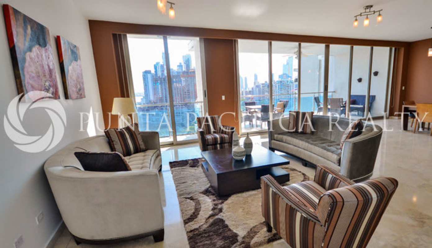 Master bedroom with floor-to-ceiling windows offering ocean skyline view PH Aqualina