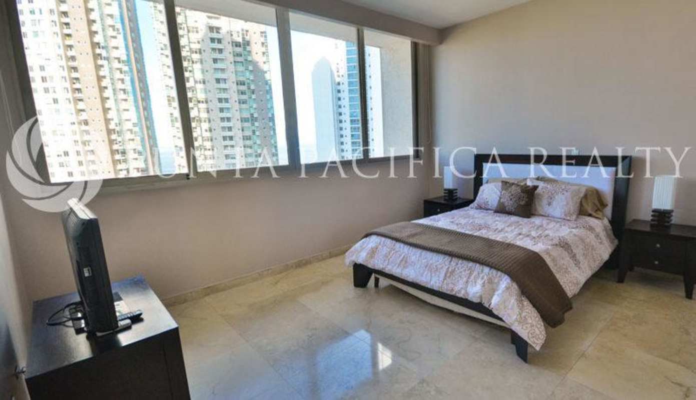 Modern bathroom with double sink, marble counters glass shower PH Aqualina