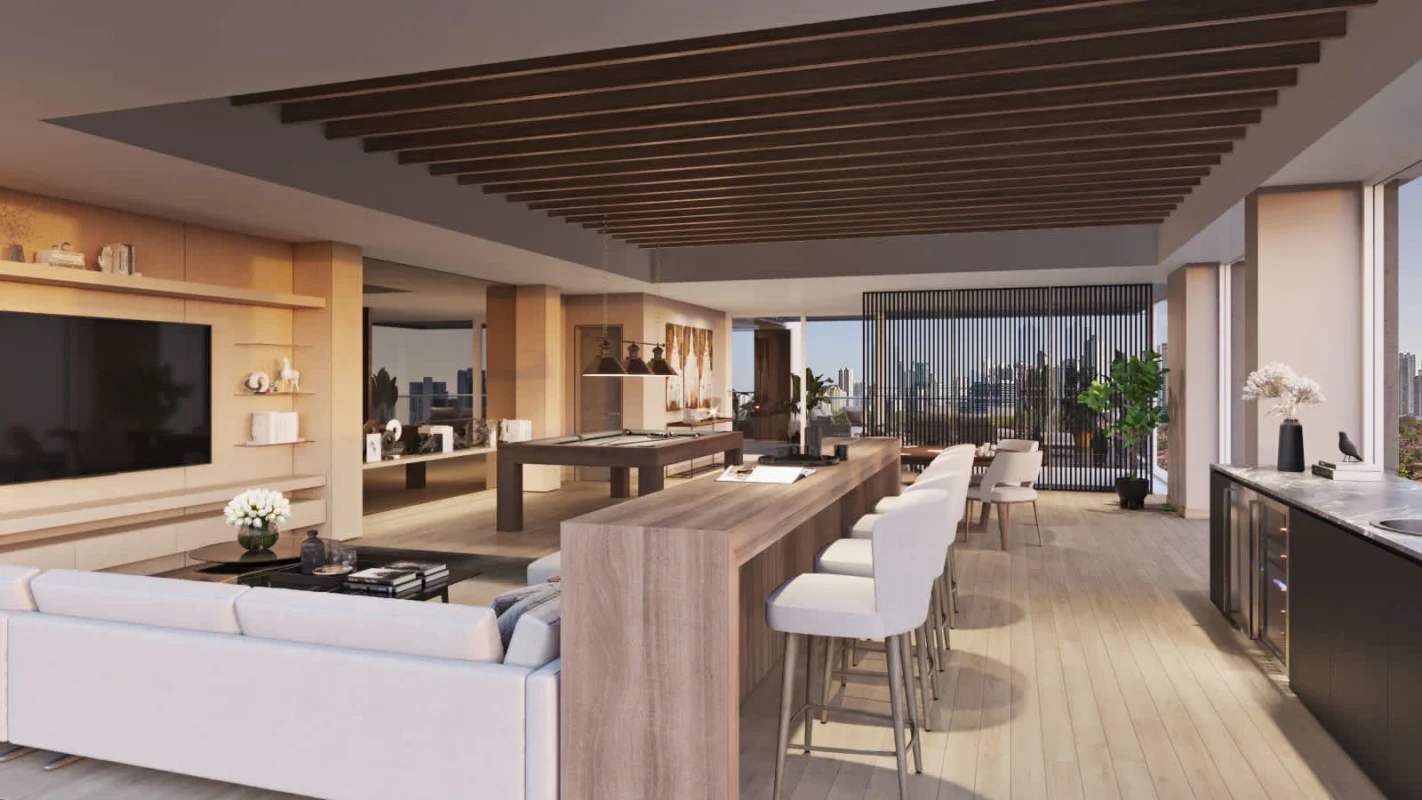 Contemporary kitchen design with island, marble finishes, and city skyline view at PH Celeste Santa Maria