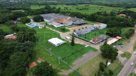 Large warehouse complex with multiple buildings, green space, pool and road access in La Villa Panama