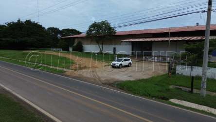 Main entrance view of industrial warehouse property with parking lot in La Villa Los Santos Panama