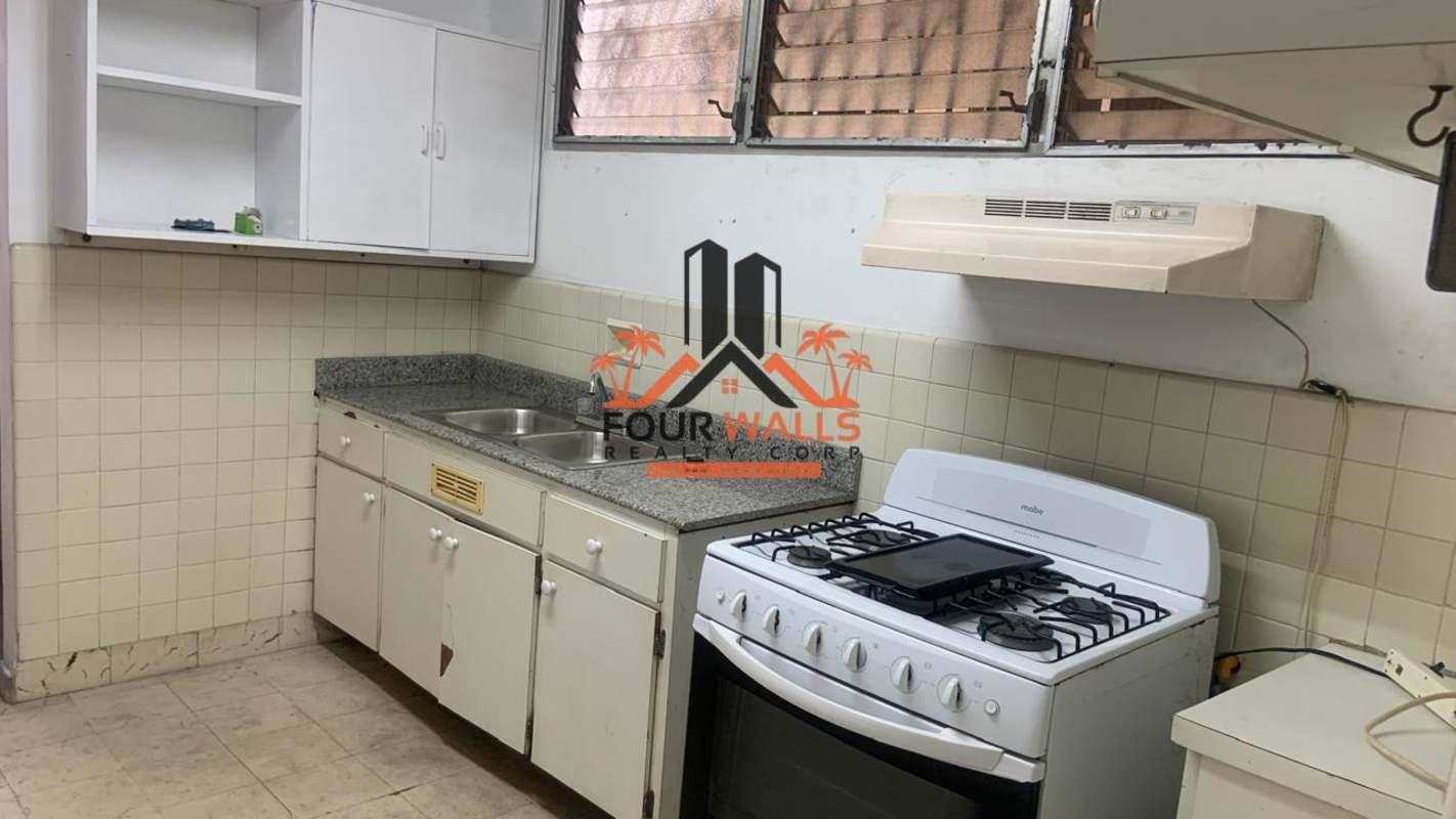 Bedroom with balcony access wood floors PH Monserrat Via Argentina Panama City