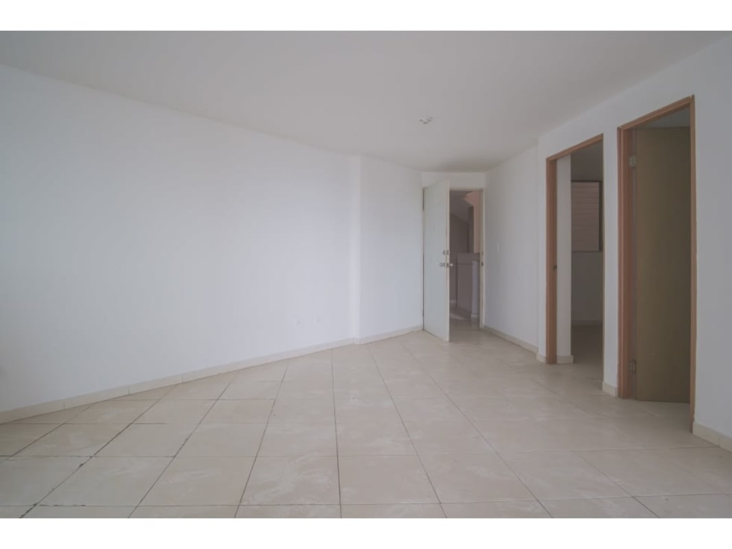 Small white kitchen with gas stove PH Llano Bonito Panama foreclosure