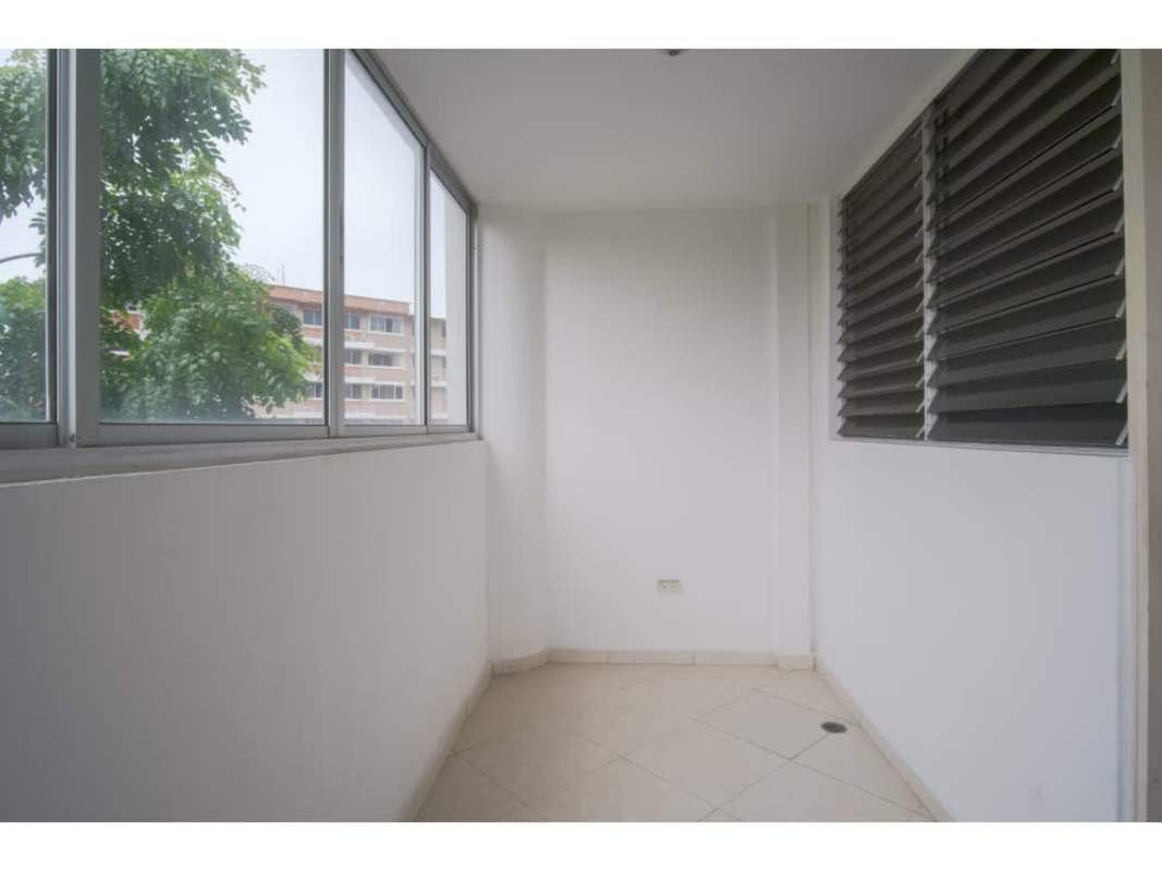 Compact minimalist kitchen with gas stove and white cabinets PH Llano Bonito