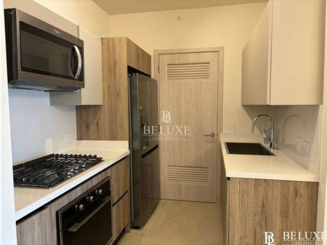 Contemporary bathroom granite counters glass shower luxury rental PH Ocean House Panama City