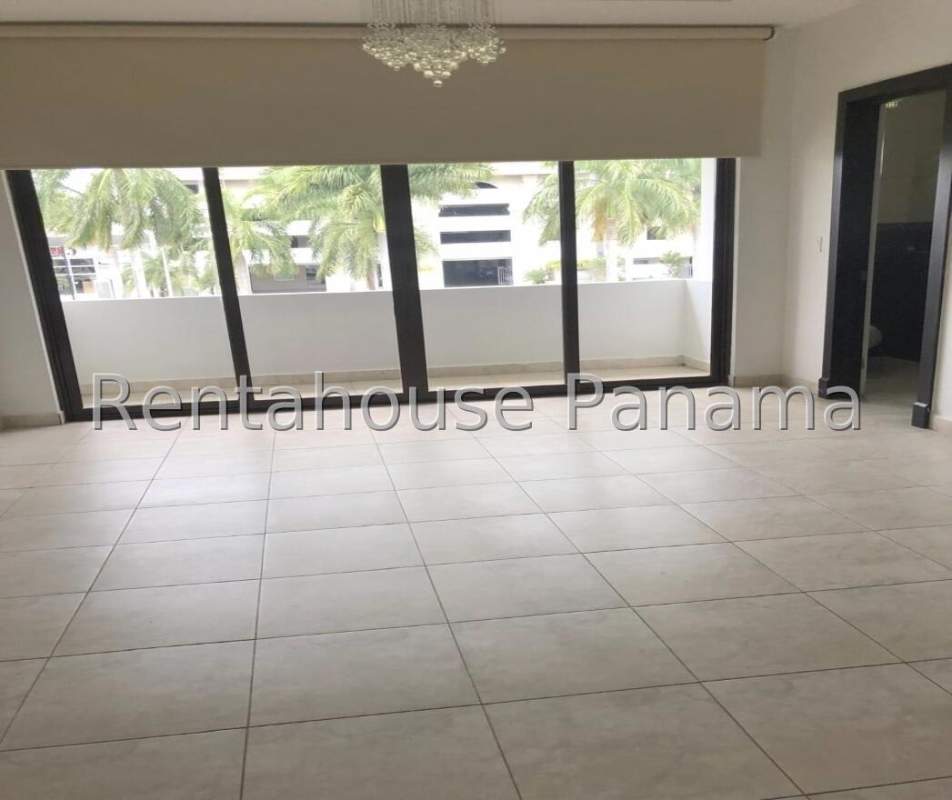 Luxury kitchen with granite island, stainless appliances, modern lighting in Costa del Este Panama