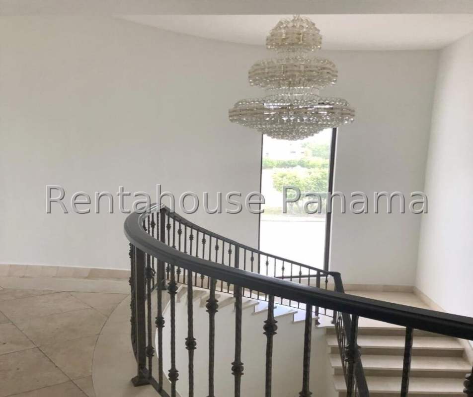 Spacious foyer with marble floor, staircase, chandelier in luxury Costa del Este home