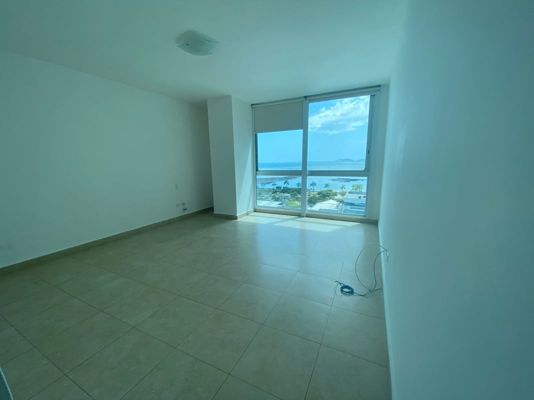 Bedroom with ocean and city skyline view large windows PH Marabierto Marbella Panama