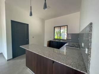 Spacious bedroom with window and walk-in closet in modern house for sale San Pablo