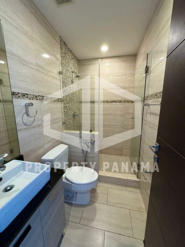 Contemporary bathroom in PH Grand Tower with glass shower, mosaic tiles and quality finishes Panama City