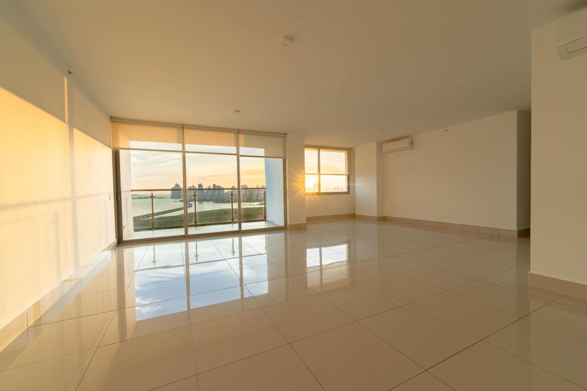Modern apartment living room with wide windows at PH Costa del Mar Panama