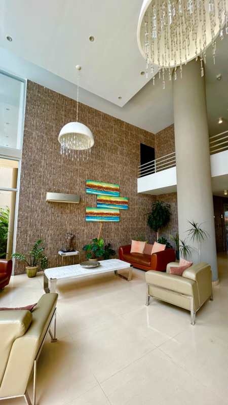 Rooftop pool with sundeck, umbrellas and skyline view in PH Sky Level Panama