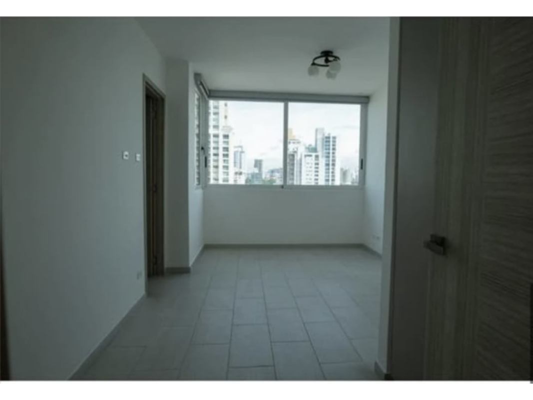 Bright master bedroom with large window offering city view in PH The Towers Panama City