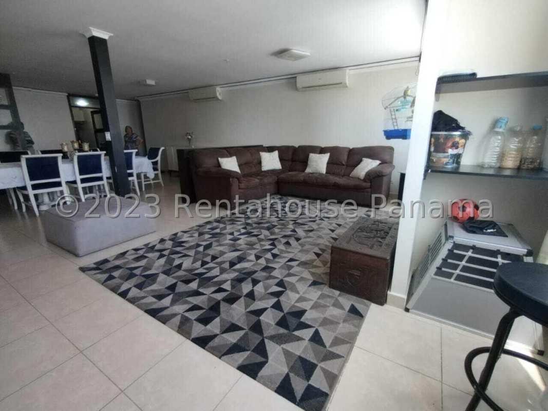 Open living and dining area with tile floor modern design in PH Parque del Mar Costa del Este Panama