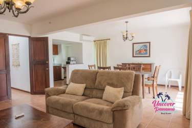 Spacious living room with sliding glass to patio in Costa Blanca Golf Villas Panama