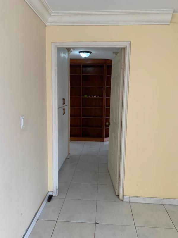 Rooftop swimming pool with city skyline and lounge area at PH Terrazas de Obarrio Panama City