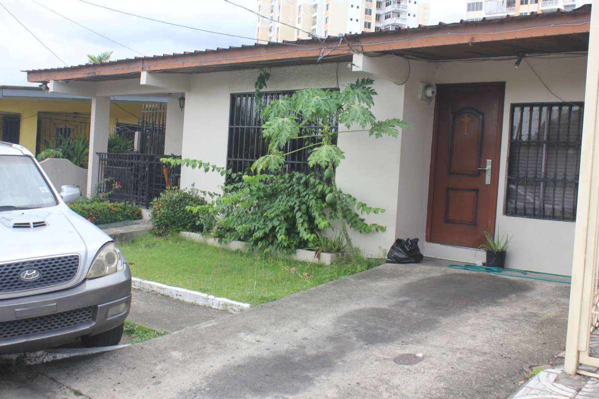 Gated entrance with metal fence secure driveway of house in Miraflores Betania Panama
