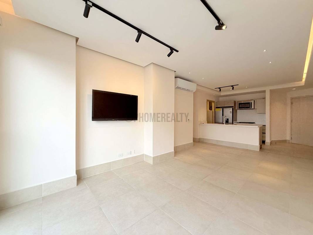 Spacious master bedroom with built-in closet and golf view in Santa Maria Apartment