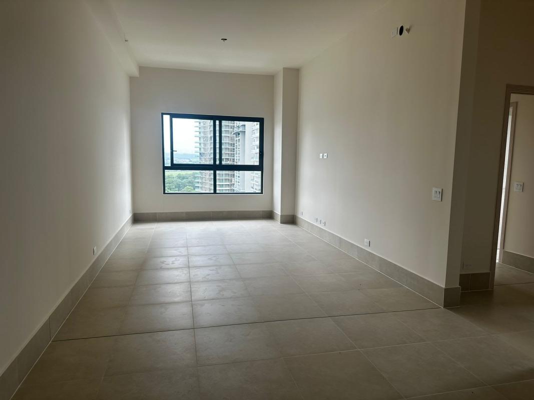 Bedroom with built-in closet and neutral tile Ocean House Santa Maria