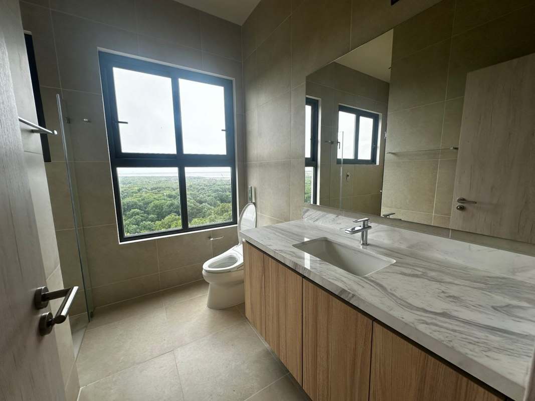 Elegant bathroom with marble vanity large mirror PH Ocean House Santa Maria Panama