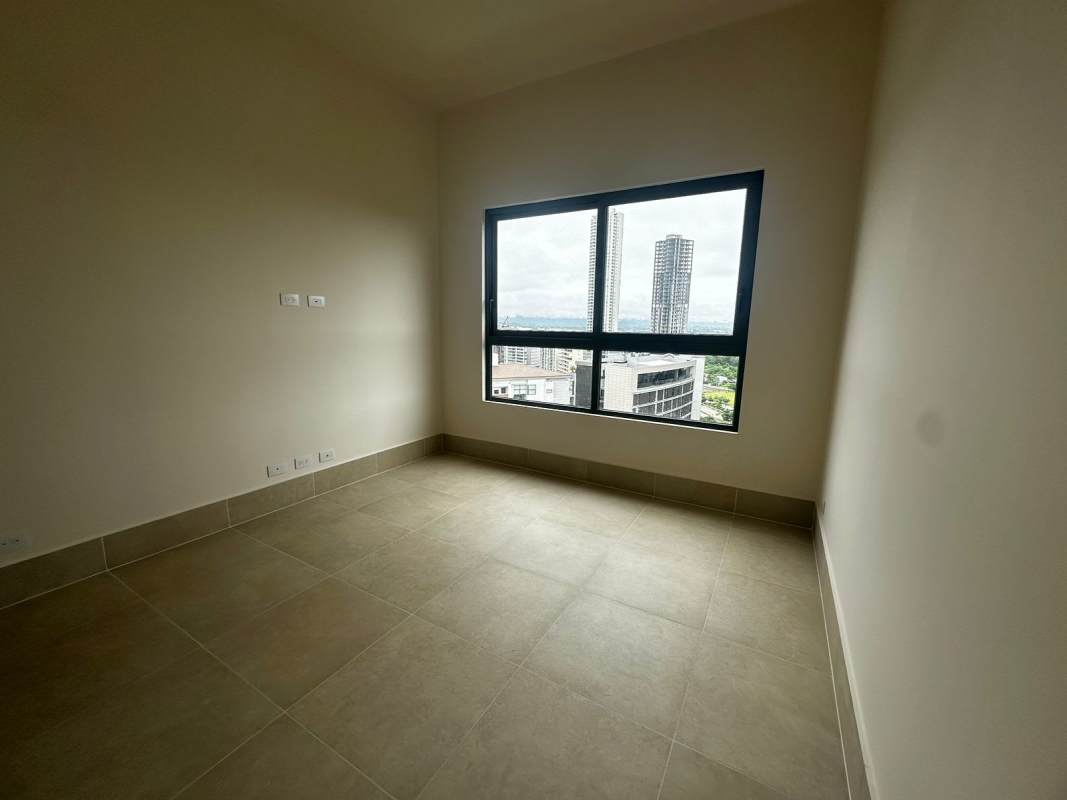 Large window bedroom cityscape view Ocean House Panama Condo