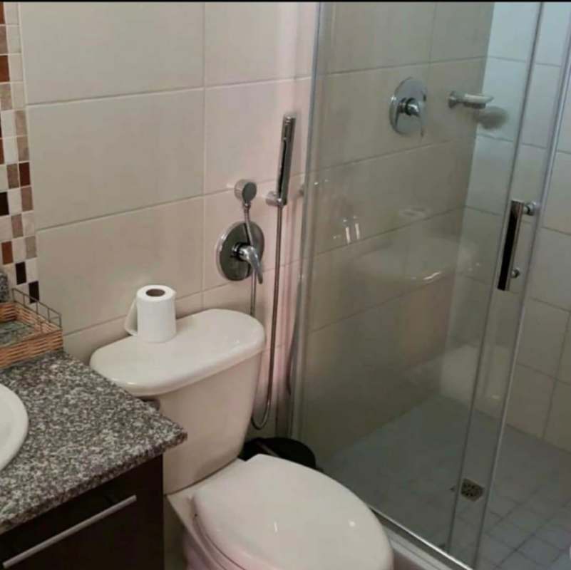 Contemporary bathroom with glass shower, granite countertop, mosaic tile in PH Lefevre 75 Panama City