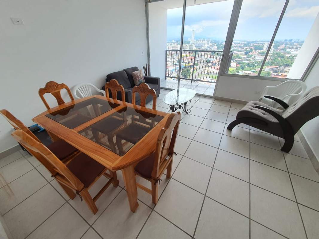 Lobby with teal accents sofas modern lighting art décor PH Lefevre 75 Panama City real estate
