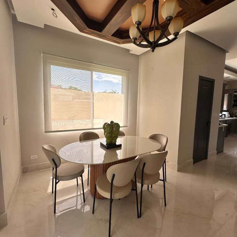Contemporary kitchen with marble countertops, gray cabinets and island in Villas del Mar Costa del Este