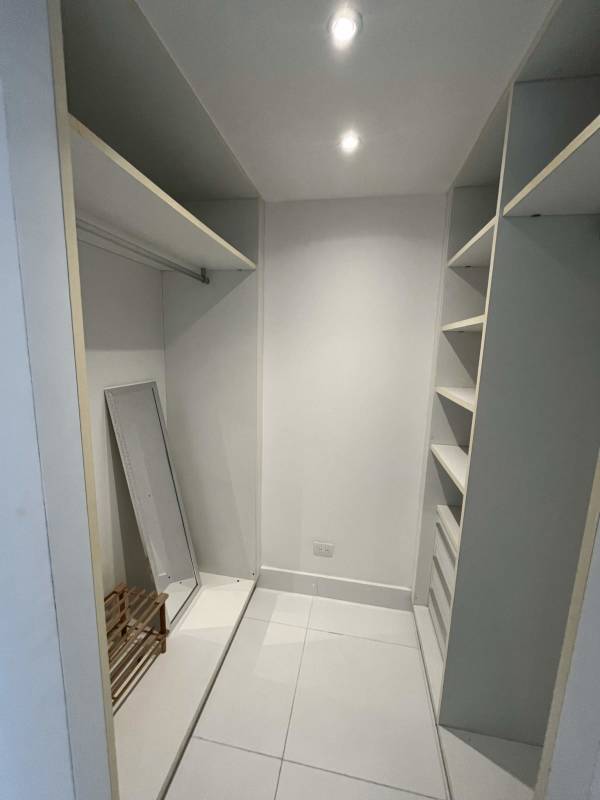 Master suite with panoramic ocean view, modern furnishings, and ensuite at PH Yoo Avenida Balboa Panama