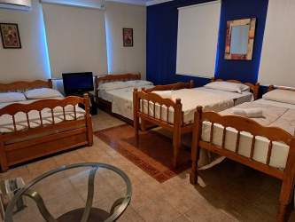 Beautiful landscaped tropical garden with mountain views, gazebo, flowers and lawn in El Valle