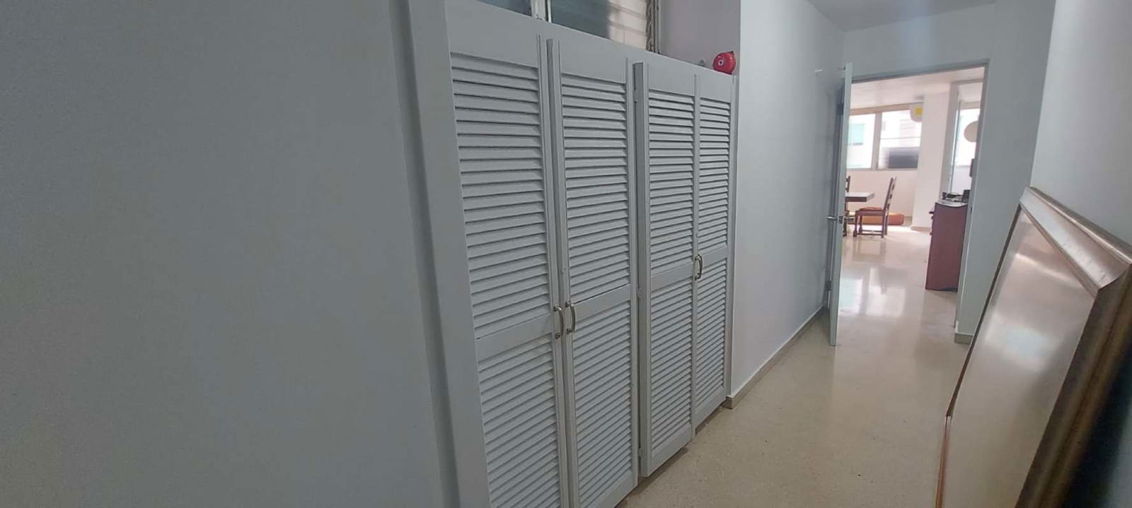 Traditional bathroom with beige tiles, frosted shower doors PH La Concha apartment Marbella
