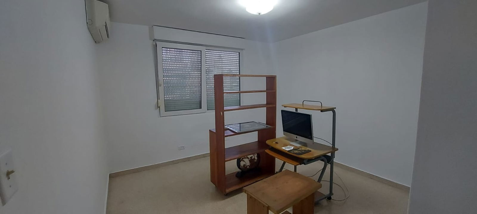 Minimalist hallway with white built-in closets PH La Concha apartment for rent Panama City