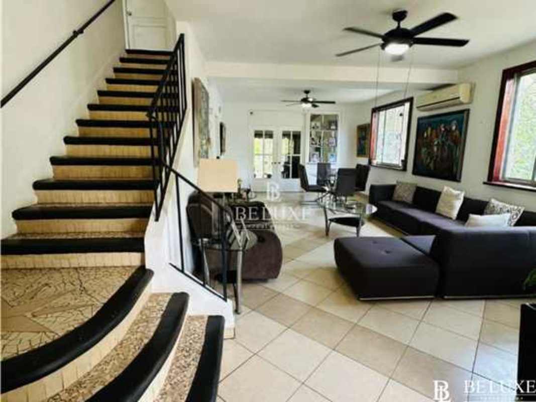 Bathroom with ceramic tiles, modern fixtures in Balboa Ancón Panama City home